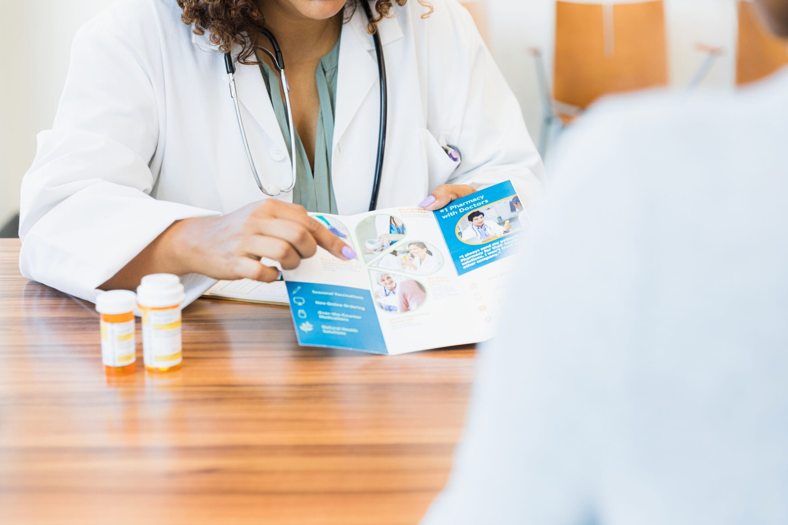 Healthcare professional explaining treatment
