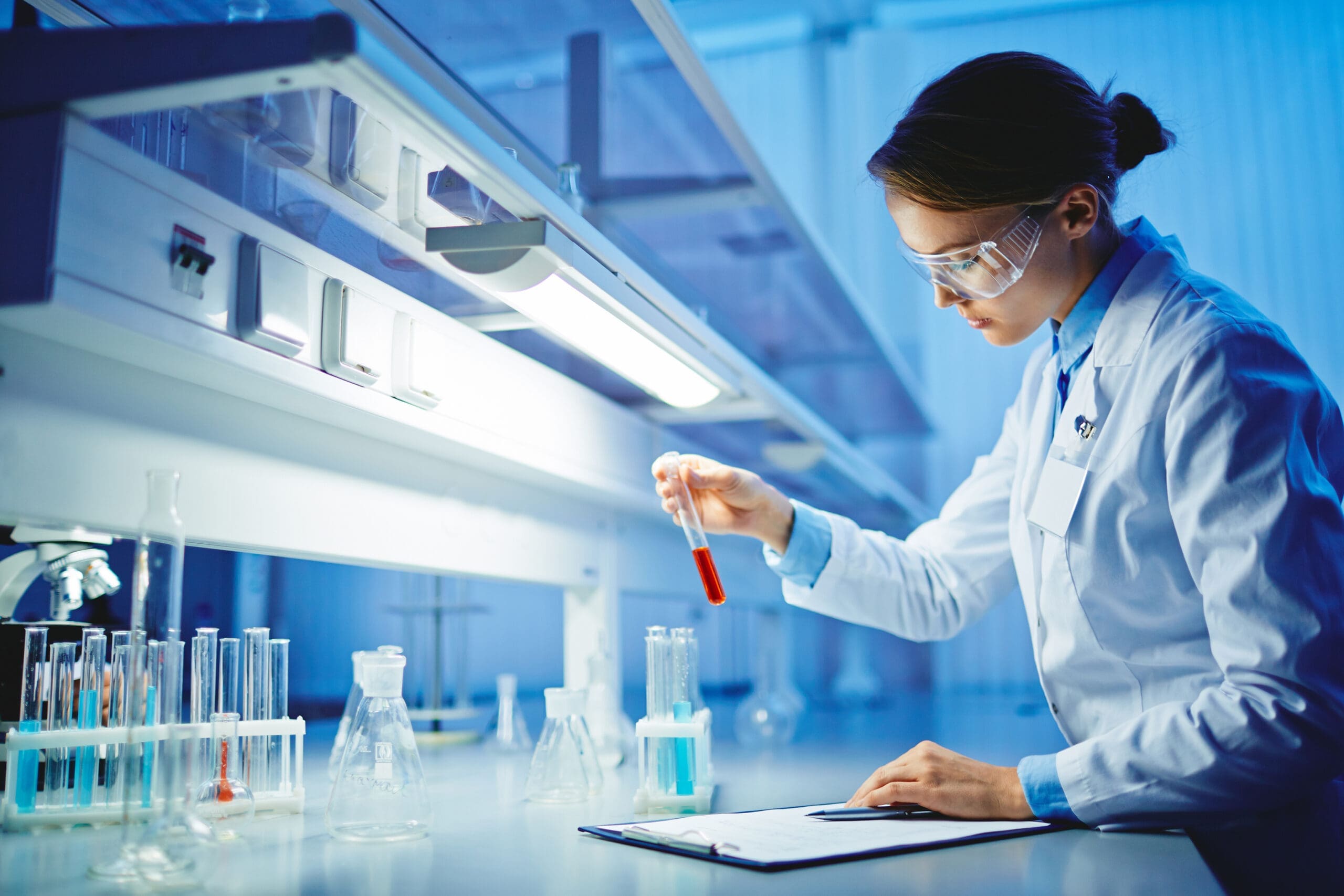 Lab technician working with chemical samples